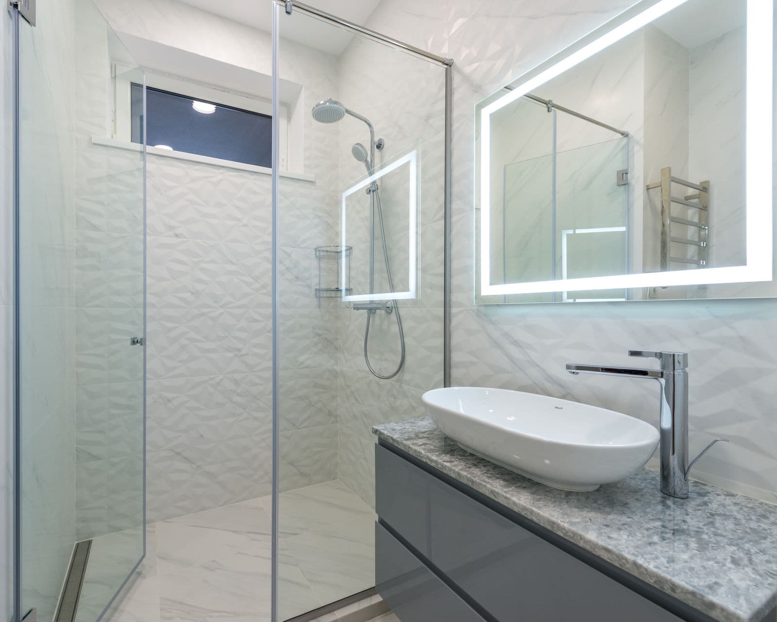 Walk-in shower and vanity unit